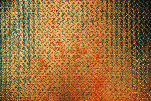 Diamond steel checkered plate texture and background. Rusty non slip steel grating for industrial concept design. Top view horizontal image.