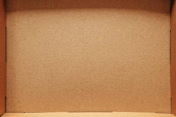 Cardboard box from above, empty box as copy space and design element