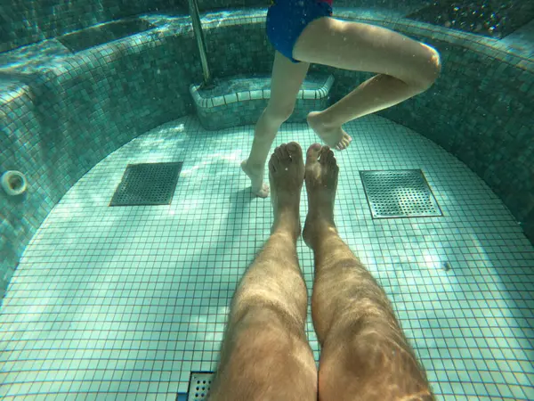 Hot Tub Pool Underwater Shot Father Son Legs Water Selective Fotos de stock libres de derechos