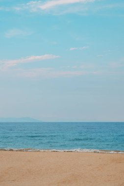 Aegean sea beach, sandy coastline of Strymonian gulf in Greece, vertical image clipart