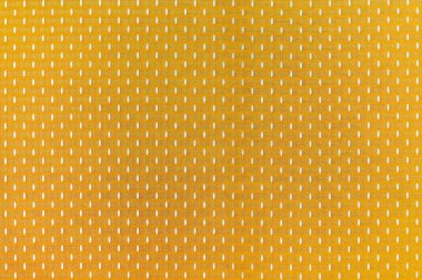 Arkaplan olarak sarı örgü malzeme dokusu ve kopyalama alanı