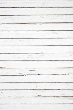 Arkaplan olarak tahta tahtalardan yapılmış eski beyaz duvar