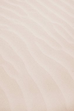 Arka plan olarak yumuşak beyaz kumsal yüzeyi dokusu