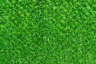 Arka plan olarak yapay yeşil çimen eskrim malzemesi dokusu, yakın plan