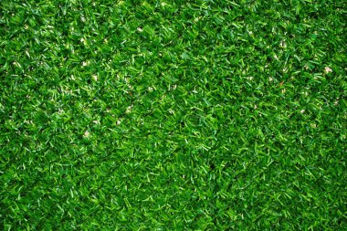 Arka plan olarak yapay yeşil çimen eskrim malzemesi dokusu, yakın plan