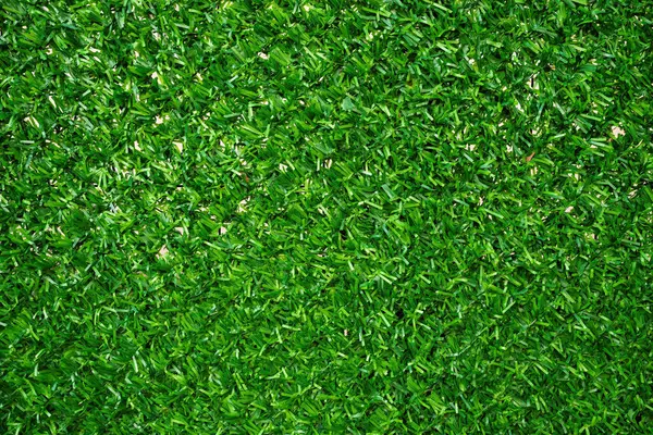 Arka plan olarak yapay yeşil çimen eskrim malzemesi dokusu, yakın plan