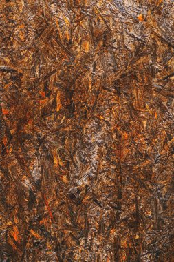 Arka plan olarak odaklı iplik (OSB) yüzeyi, kahverengi boyalı ahşap, dikey resim