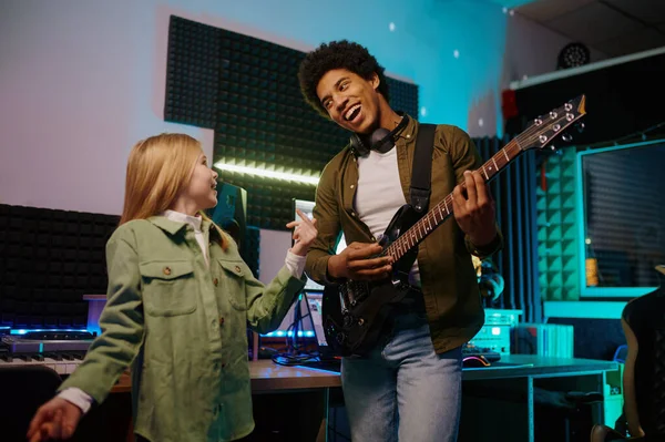 Young Teenager Girl Singing Song Mixing Track Man Guitarist Record — Stock Photo, Image