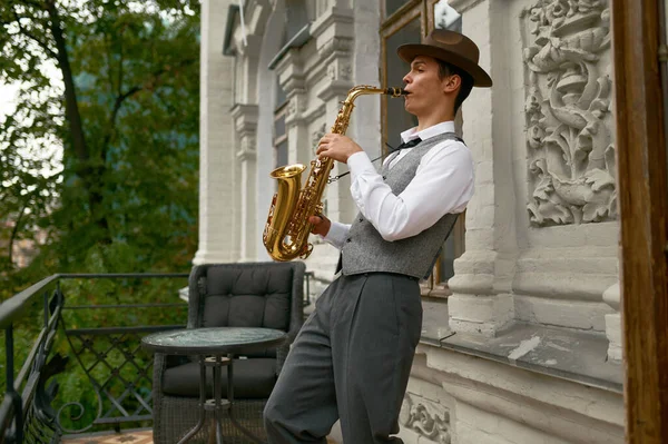 Young Male Musician Practicing Saxophone Balcony Home Inspired Saxophonist Playing — Stok fotoğraf
