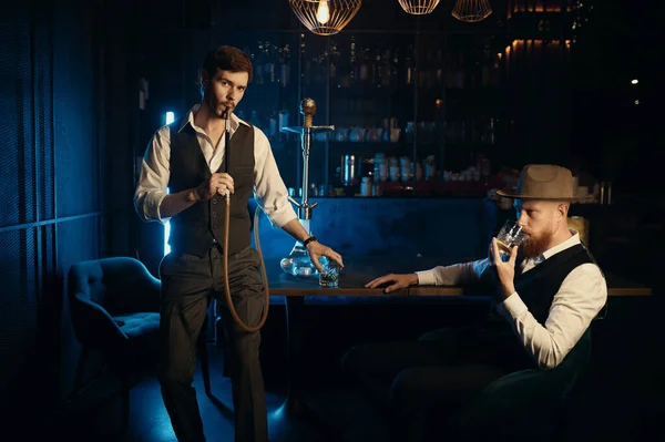 Serious Guys Smoking Hookah While Rest Pub Male Bachelor Mafia — Foto de Stock