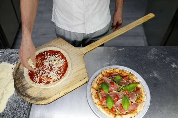 View Chef Hand Adding Cheese Pizza Base Sauce Man Pizzaiolo — Stock Photo, Image
