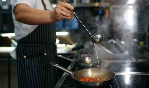 Chef Adding White Wine Frying Pan Cherry Tomato Sauce Pasta — Stockfoto