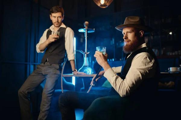 Serious Guys Smoking Hookah While Rest Pub Male Bachelor Mafia — Zdjęcie stockowe