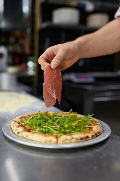 Delicious Pizza Preparation Process Closeup Chef Hand Holding Slice Bacon — Stock Photo, Image