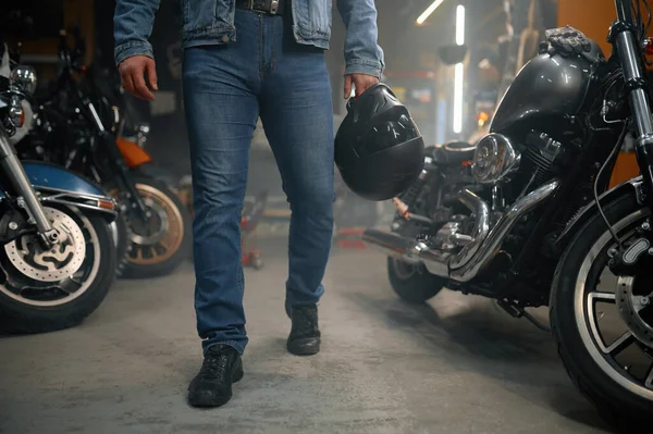 Cropped Shot Biker Carrying Helmet Standing Motorcycle Row Garage Workshop — Stock Photo, Image