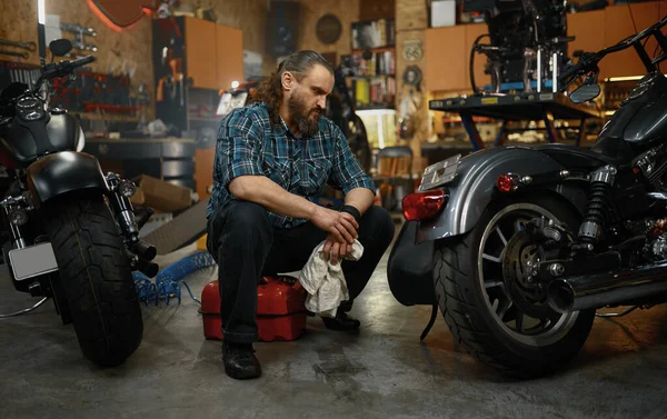 Bearded Mature Man Biker Cleaning Motorcycle Garage Workstation Portrait Male — Stock Photo, Image