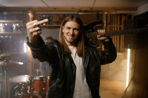 Rock Musician Holding Electric Guitar Shoulder Gesturing Fuck Middle Finger — стоковое фото