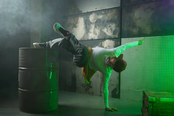 Male Break Dancer Performing Loft Stage Green Neon Light Professional — Stock Photo, Image