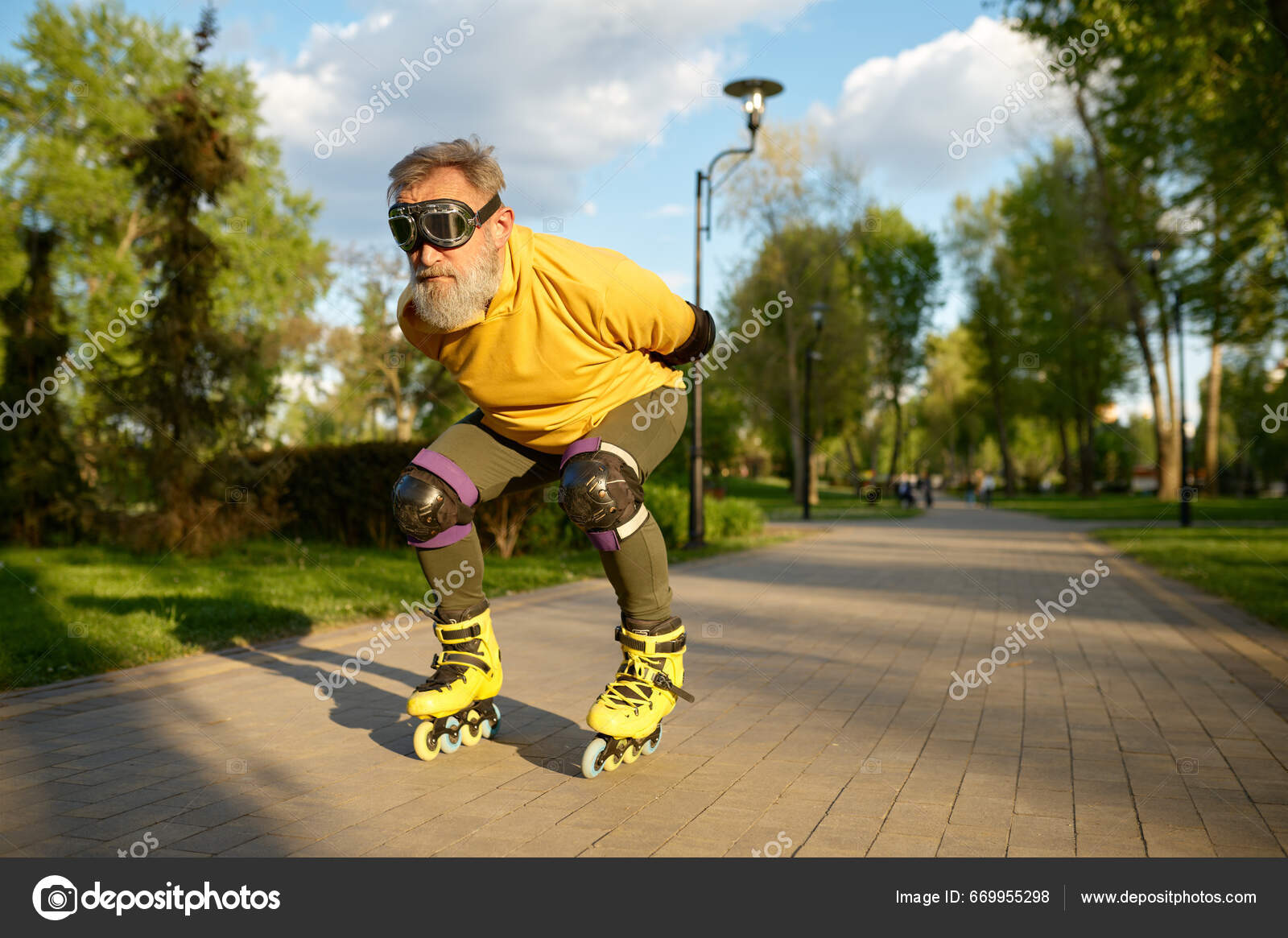 Senior Man Wearing Funny Goggles Enjoying Speed Ride Roller Skates Stock  Photo by ©Nomadsoul1 669955298