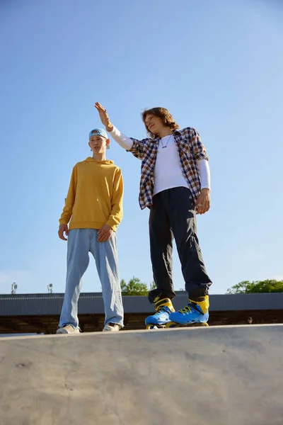 Two Teenager Sportsman Discussing Future Free Riding Race Roller Skates — Stock Photo, Image