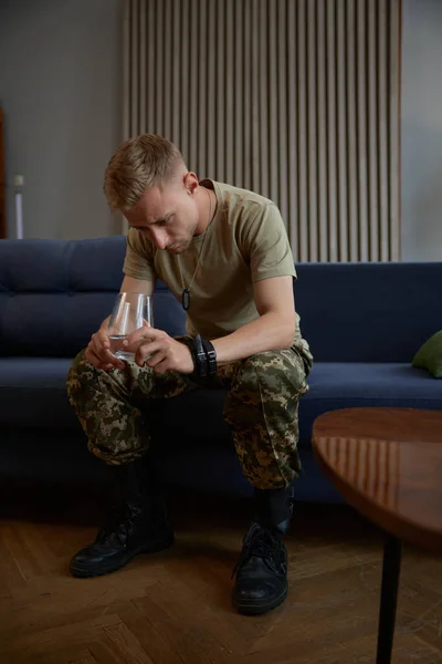 Stressed Young Soldier Drinking Water Suffering Ptsd Evening Home — Stock Photo, Image