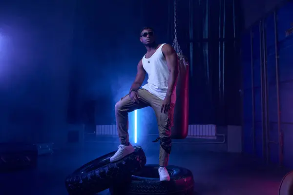 Trendy Fashion Muscular Rapper Wearing Sunglasses Standing Neon Lights Cool — Stock Photo, Image