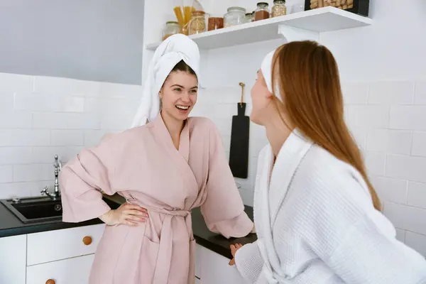 Happy Girls Wearing Bathrobe Wrapped Towel Head Standing Chatting Home — Stock Photo, Image