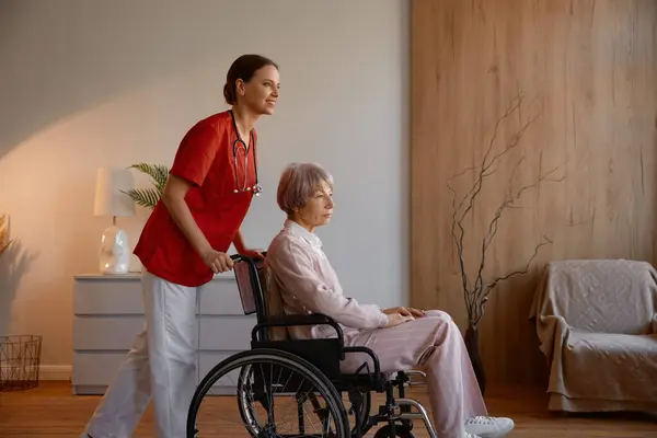 Woman Caregiver Preparing Elderly Lady Wheelchair Walk Daily Routine Everyday — Stock Photo, Image