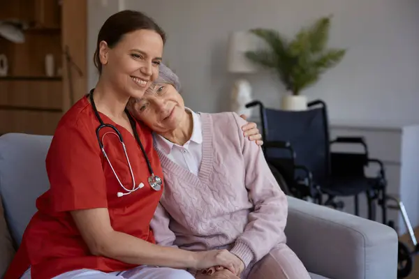 Smiling Happily Caregiver Hugging Her Old Lady Patient Portrait Concept — Stock Photo, Image