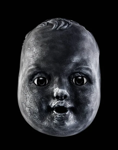 Old Cracked Creepy Doll Head Isolated Black Background — стоковое фото