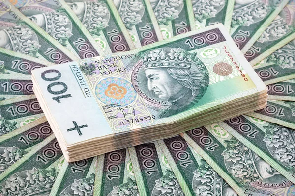 Pile of polish money 100 zloty banknotes