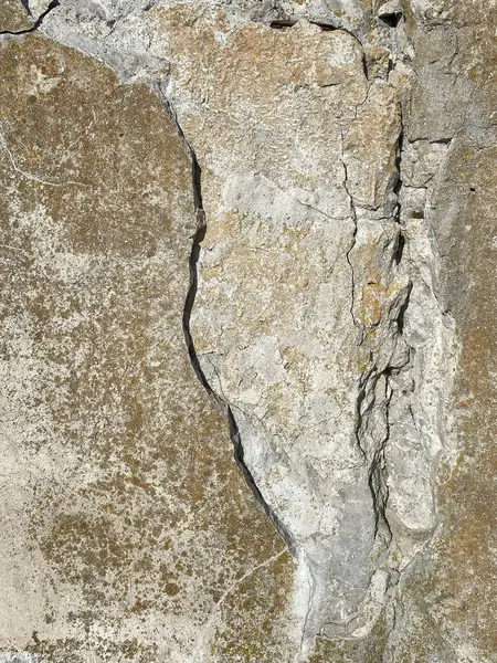 古いひび割れたグランジコンクリートの壁の質の背景 ロイヤリティフリーのストック画像