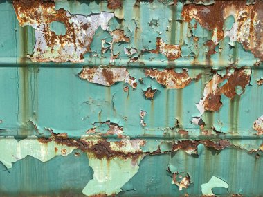 Arkaplan deseni paslı çelikten, kabuğu soyulmuş.