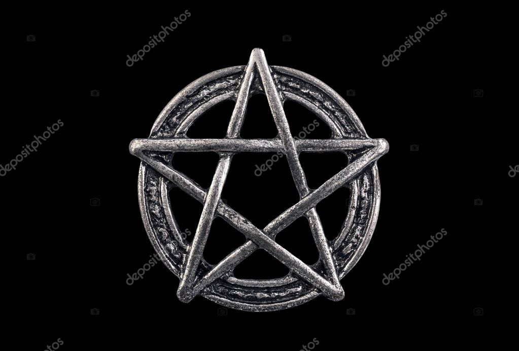 Metal pentagram symbol isolated on black background with clipping path