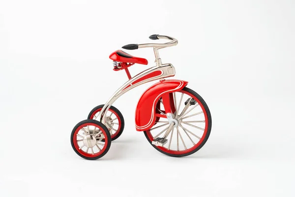 Small tiny metal toy bike, replica of a 1937 De Luxe Velocipede.