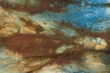 Tied dyed fabric with moody designs for background
