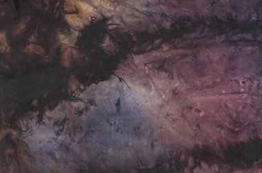 Tied dyed fabric with moody designs for background