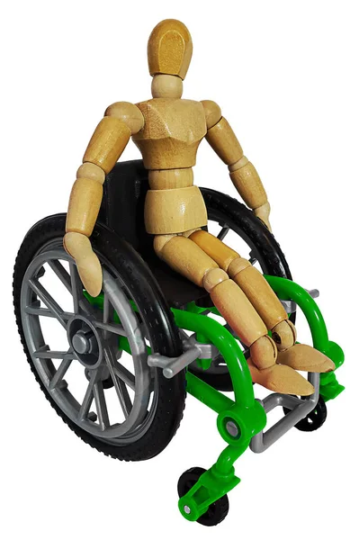 Человек Зелёном Инвалидном Кресле — стоковое фото