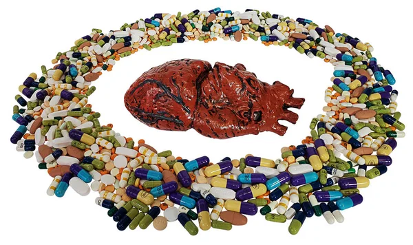 Een Model Van Het Menselijk Hart Omringd Door Pillen — Stockfoto