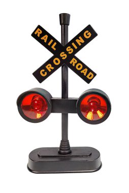 Bir demiryolu geçidi ışığı diğerlerini geçiş trenine karşı uyarır.