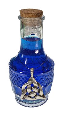 Kelt düğümlü bir şişede renkli sihirli bir iksir.