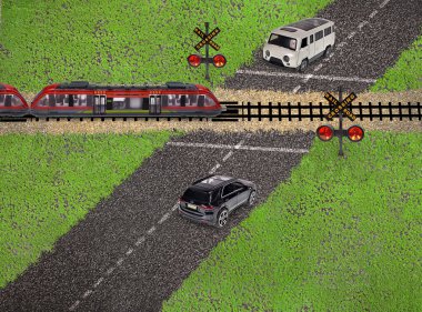 Yolcuları geçecekleri yerlere götürmek için kırmızı tren bekleyen arabalar.