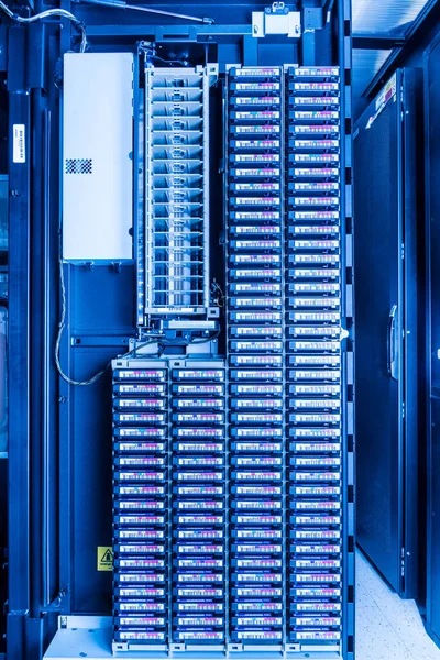 data cloud tapes inside data center racks