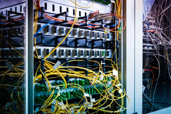 server inside data center with ethernet cables connected to data switch
