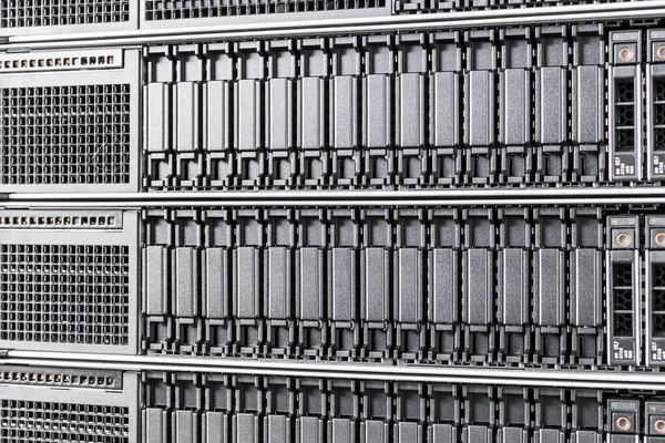 Row of hard disks used for data storage in internet data center