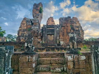 Ruin of East Mebon Temple, Ankgor by sunset, Cambodia clipart