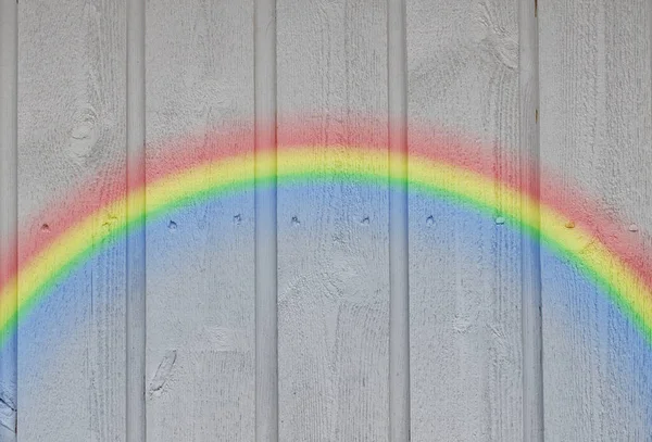 Hölzerne Wand Hintergrund Mit Einem Regenbogen Stockbild