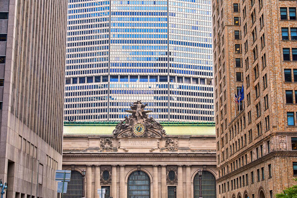 South facade of Grand Central Station with clock and statue in New York City