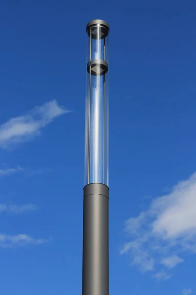a street lamp with Led technology, blue sky in the background