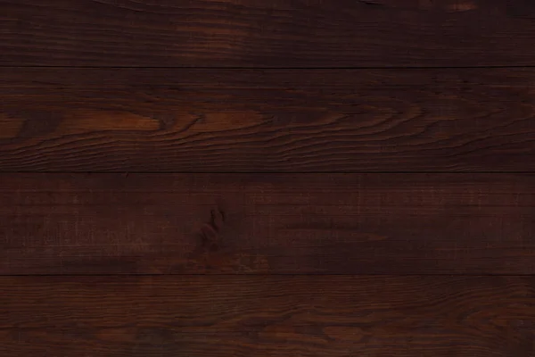 板で作られた濃い茶色の木製の壁背景 — ストック写真